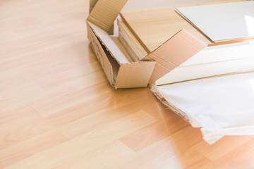 woman unpacking a box