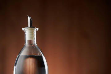 white vinegar on the wooden table top