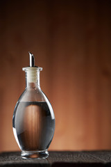 white vinegar on the wooden table top