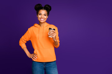 Portrait of her she nice attractive lovely cheerful cheery brunette girl in hoody drinking cappuccino isolated over bright vivid shine vibrant lilac violet purple color background