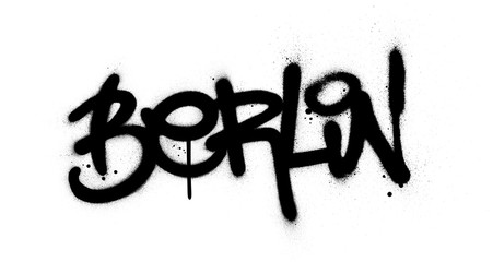 graffiti Berlin word sprayed in black over white © johnjohnson
