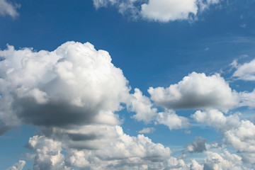 Naklejka na ściany i meble a beautiful blue sky day with white clouds as background.