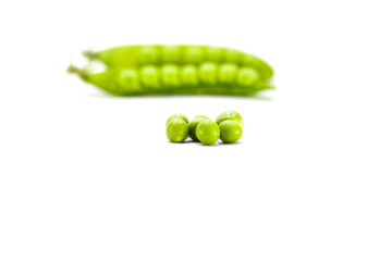 Fresh green peas isolated on white background