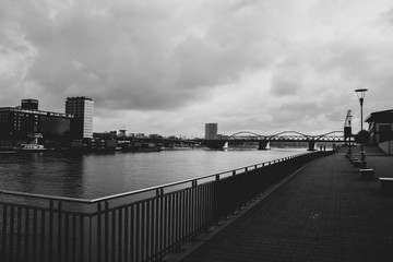 riverside pathway in front of a mall