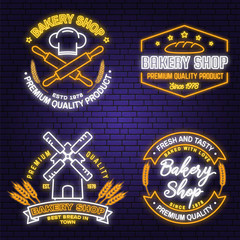 Fototapeta premium Set of Bakery shop neon bright signboard, light banner. Vector. Concept for badge, shirt. Neon design with rolling pin, dough, wheat ears silhouette. For restaurant identity