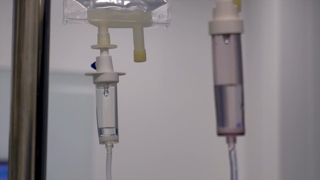 Plastic tubes with medicine in a dropper in a hospital