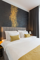 Interior of a double bed hotel bedroom - obrazy, fototapety, plakaty