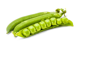 Fresh green peas isolated on white background