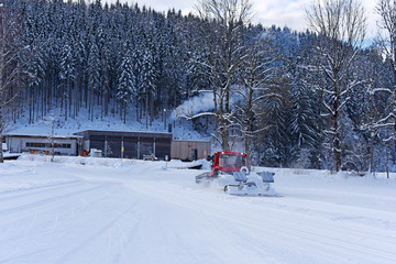 Winter landscape at early morning in small village and ski resort Werfenweng, Austria, Europe.