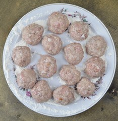  tasty and fresh meatballs lie on a plate