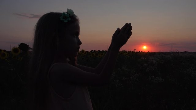 4K Kid Praying, Child Saying Prayer,  Pensive Girl Portrait Meditating at Sunset