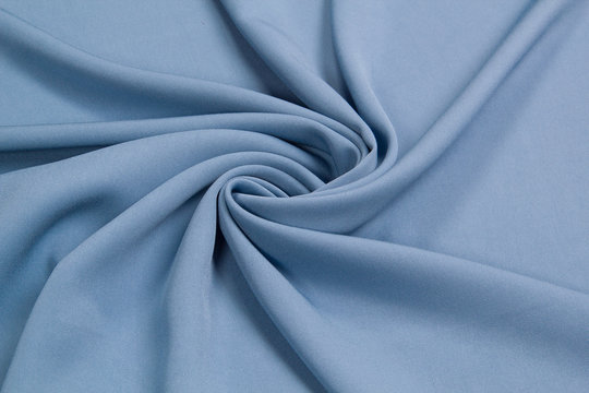 Fabric suit fold top view. Blue textile