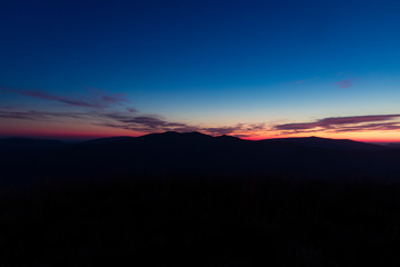 mountain ridge silhouette background landscape scenic view midnight blue sky wallpaper pattern scenic view with empty copy space fro your text here