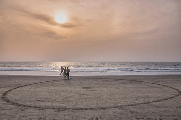 North Goa, India - December 17, 2018. People relaxing on the beautiful Arambol beach.