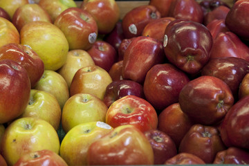 Close-up of red apples on display in market