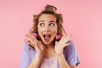 Image of young frightened woman screaming and looking aside