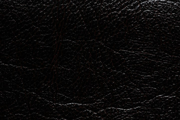 Strict dark dermatin background. High quality texture.
