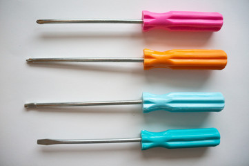 Colorful screwdrivers symetrically lined up