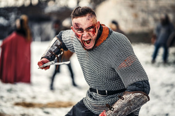 The evil emotions of a young warrior who goes to battle with the sword. Battle near the castle in...