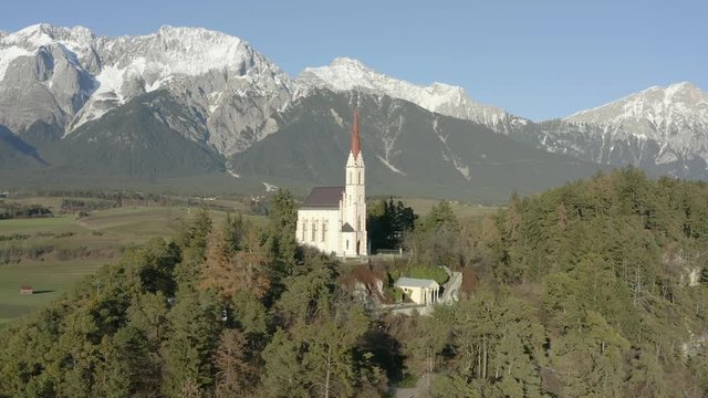 Landscape shot capturing the whole view of Maria Locherboden and the mountains of Innsbruck, Austria.