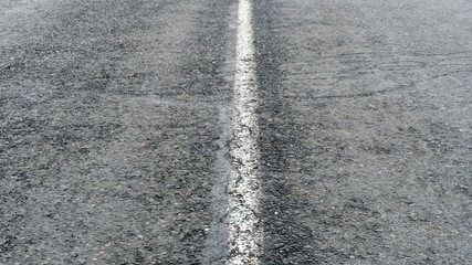 Fototapeta premium asphalt and marking closeup