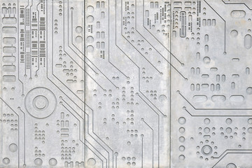 Concrete wall background with carved pattern of digital electronics circuit