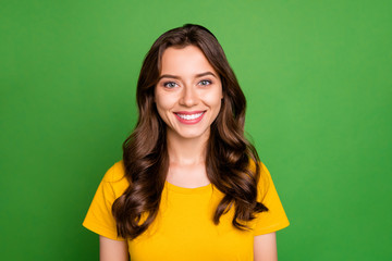 Close-up portrait of her she nice attractive lovely pretty cute cheerful cheery wavy-haired girl college high school student isolated over bright vivid shine vibrant green color background