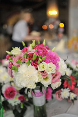 bouquet in the hands of the bride