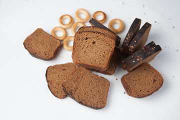 Fresh brown bread slice isolated on white background