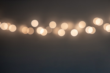  blurry golden lights line on smooth beige background