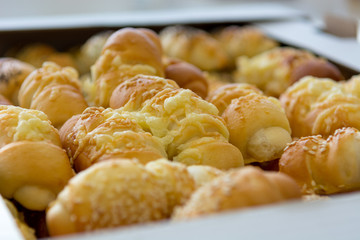 Many bite size croissants ready to be served.