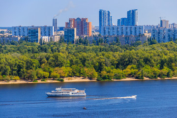Fototapeta na wymiar Tourist ship sailing on the Dnieper river in Kiev, Ukraine