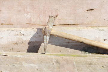 hammer lying on wood  at construction site