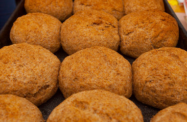 closeup of baked buns in a pan
