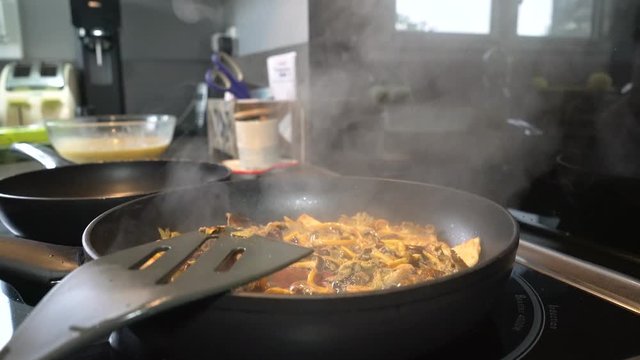 Pan of omelet with mushrooms