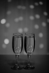Two glasses of pink champagne for the couple.