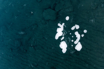 frozen bubbles in the ice structure of a frozen lake