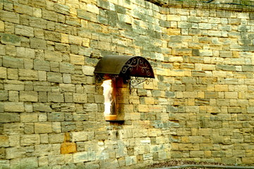 old brick wall with window