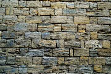 old brick wall made of shell stone