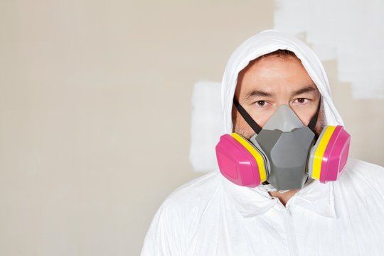 Portrait Of A Manual Worker Wearing A Dust Mask