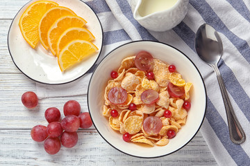 Tasty healthy breakfast served on white wooden table, flat lay