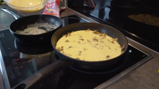 Pan of omelet with mushrooms