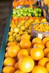 Close-up of oranges on display in market
