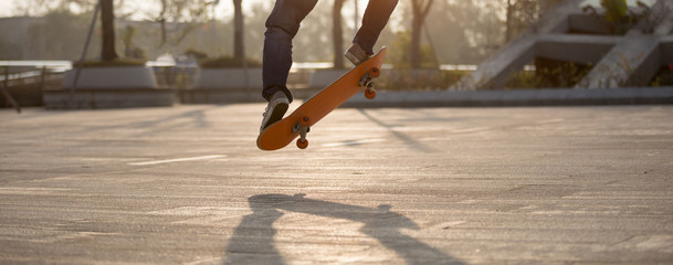Skateboarder skateboarding at sunrise park © lzf