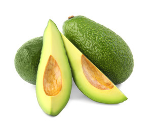 Tasty ripe avocados on white background. Tropical fruit