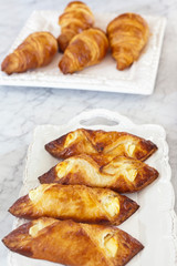 Fresh croissants in serving dish