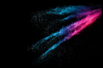 Explosion of colored powder isolated on black background. Abstract colored background. holi festival.