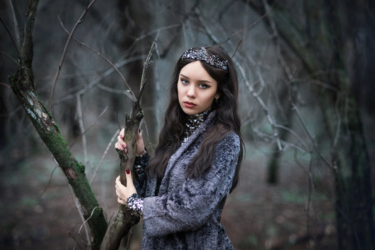 portrait of a girl in a fairy tale image of a dark Queen in a mysterious forest