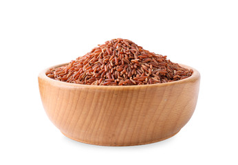 Brown rice in wooden bowl isolated on white