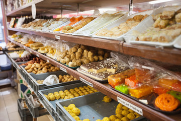 Variety of Indian sweets displayed at store